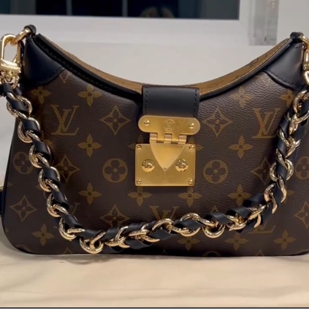 LV crossbody bag. Price negotiable.